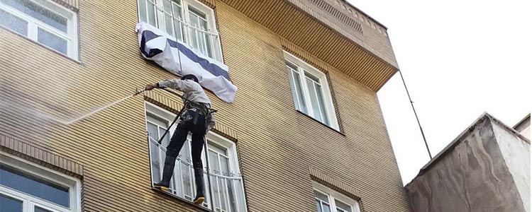 سندبلاست نما ساختمان و قیمت سندبلاست سنگ و اجر با طناب